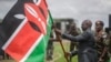 Kenya's President William Ruto, left, attends a flag-handover ceremony for members from the Kenya Defence Forces (KDF), ahead of their deployment to eastern Democratic Republic of Congo at the Embakasi garrison in Nairobi, Kenya, Nov. 2, 2022. 