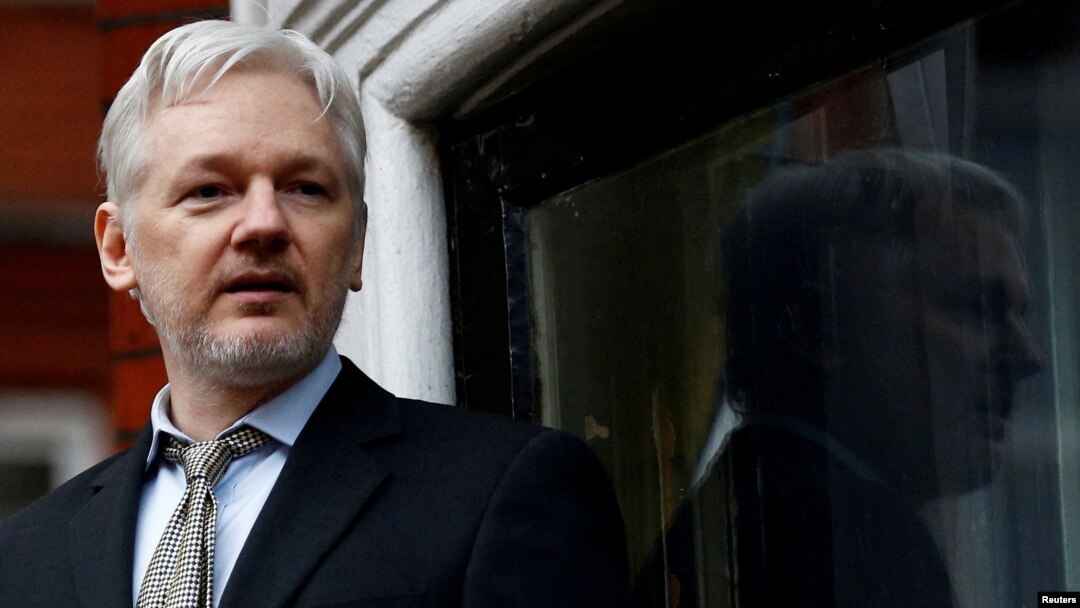 FILE - WikiLeaks founder Julian Assange makes a speech from the balcony of the Ecuadorian Embassy in central London, Feb. 5, 2016. His lawyers will try to overturn an extradition approval at a hearing beginning Feb. 20, 2024, in London's High Court.