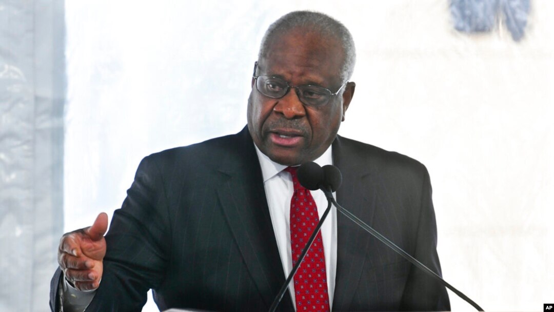 FILE - Supreme Court Justice Clarence Thomas delivers a keynote speech during a dedication of Georgia new Nathan Deal Judicial Center in Atlanta, Feb. 11, 2020. 