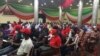 Attendees listen to health authorities at an Abuja summit to create awareness about tuberculosis in Nigeria, during the World Tuberculosis Day celebration, March 24, 2022. (Timothy Obiezu/VOA)