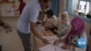 Tunisians Vote on Controversial New Constitution 