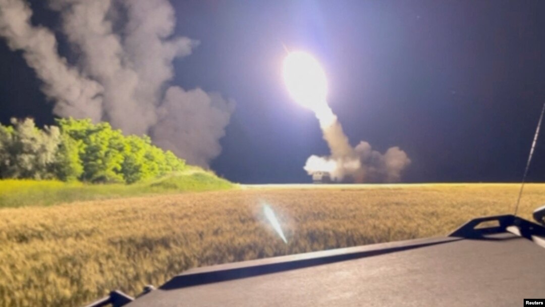 FILE - A High Mobility Artillery Rocket System (HIMARS) is fired in an undisclosed location in Ukraine in this still image obtained from an undated social media video uploaded on June 24, 2022.