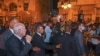 A handout picture provided by the Tunisian presidency press service shows President Kais Saied celebrating with supporters on Habib Bourguiba Avenue in Tunis, July 26, 2022 after the projected outcome was announced. (Photo by Tunisian Presidency / AFP)