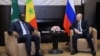 Russia's President Vladimir Putin (right) attends a meeting with Senegal's President Macky Sall, who is currently the chairman of the African Union, at the Bocharov Ruchei state residence in Sochi, Russia, June 3, 2022, in a Sputnik/Mikhail Klimentyev/Kre