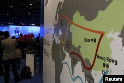 FILE - A map illustrating China's silk road economic belt and the 21st-century maritime silk road, or the "Belt and Road" megaproject, is displayed at the Asian Financial Forum in Hong Kong, China Jan. 18, 2016.