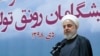 In this photo released by official website of the Office of the Iranian Presidency, President Hassan Rouhani speaks in a meeting in Tehran, Iran, Tuesday, Jan. 14, 2020.