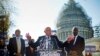 Democratic presidential candidate Sen. Bernie Sanders, center, and Sen. Jeff Merkley (l) announce new climate legislation, Nov. 4, 2015, during a news conference on Capitol Hill in Washington.