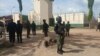 Security officers stand guard at the Kuje prison in Abuja, July 6, 2022, while search- and-rescue operations continued to recapture hundreds of inmates released by gunmen the night before. (Timothy Obiezu/VOA)