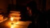 People have again resort to candlelight as power outages become common in Bangladesh. (Photo by Nazmul Islam)