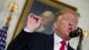 President Donald Trump speaks about the partial government shutdown, immigration and border security in the Diplomatic Reception Room of the White House, in Washington, Jan. 19, 2019.