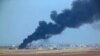 In this photo taken from the Turkish side of the border between Turkey and Syria, in Akcakale, Sanliurfa province, southeastern Turkey, smoke billows from a fire inside Syria during bombardment by Turkish forces, Oct. 9, 2019. 