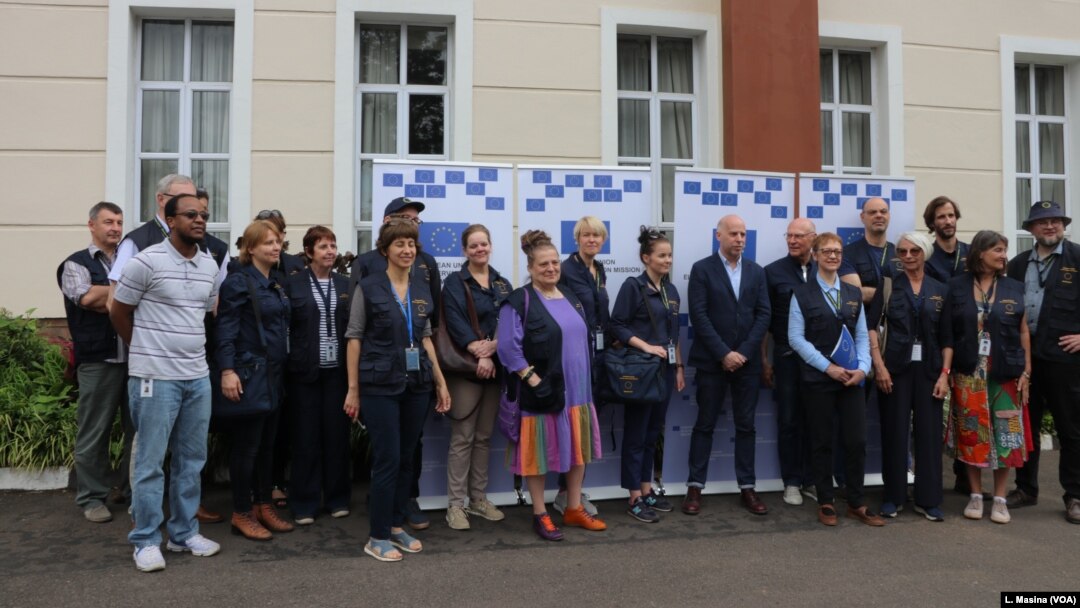 Members of the EU observer mission team pose for a group photo before their deployment Thursday in Blantyre.
