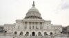 Runners stride past the U.S. Capitol building on the day of U.S. President Donald Trump's evening State of the Union address to a joint session of the U.S. Congress at the Capitol in Washington, U.S. Jan. 30, 2018. 
