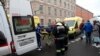 People carry a subway blast victim into an ambulance after explosion at Tekhnologichesky Institut subway station in St. Petersburg, Russia, April 3, 2017. 