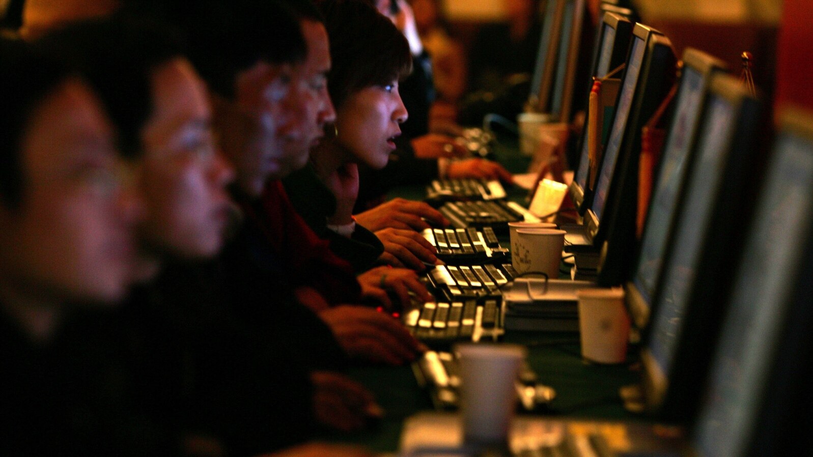 FILE - Chinese are seen working on computer work stations. Called 'bo ke' in Chinese, blogs are hugely popular, especially among the young, despite strict rules on content enforced by the government.