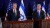 Israeli Prime Minister Benjamin Netanyahu (R) looks on as US Secretary of State Antony Blinken gives statements to the media inside The Kirya, which houses the Israeli Defence Ministry, after their meeting in Tel Aviv on October 12, 2023.