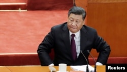 中國國家主席習近平在北京人大會堂參加紀念中國改革開放40年的紀念會。（2018年12月18日） 