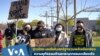 A group of Asian Americans gathers to raise awareness about the increase in hate crimes against Asians in the US near Chinatown Los Angeles, CA.