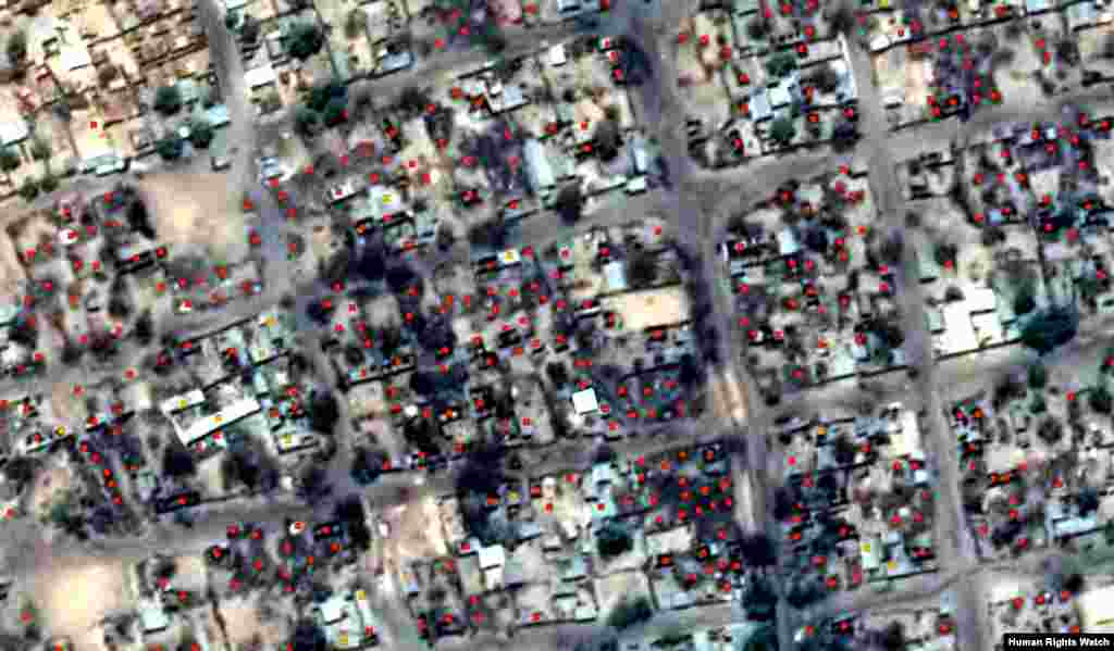 Post-violence view of concentration of building damages – damages annotated in red. Tantance lalatar: Kungiyar Human Rights Watch; Na’urar Tauraron Dan Adam: Pleiades-1A Image Copyright: CNES 2013. Source: Astrium.