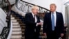 FILE - President Donald Trump and Britain's Prime Minister Boris Johnson, left, speak to the media before a working breakfast meeting at the Hotel du Palais on the sidelines of the G-7 summit in Biarritz, France, Aug. 25, 2019.