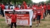 People march during a protest calling on the government to rescue the kidnapped girls of the government secondary school who were abducted two years ago, in Abuja, Nigeria, April 14, 2016.