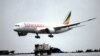 FILE - An Ethiopian Airlines Dreamliner Boeing 787 lands at Bole International airport in Addis Ababa, Ethiopia. 
