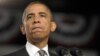 President Barack Obama pauses as he speaks about the Aurora, Colorado shooting at a campaign event in Ft. Myers, Florida, July 20, 2012.