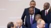 Ethiopian Prime Minister Abiy Ahmed, top center, looks as Egyptian President Abdel-Fattah el-Sissi, bottom left, and Russian President Vladimir Putin, bottom right, at the Russia-Africa summit in the Black Sea resort of Sochi, Russia, Oct. 24, 2019. 