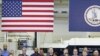 President Barack Obama gestures during a speech on the economy at the Rolls-Royce engine manufacturing plant in Prince George, Virginia, March 9, 2012.