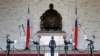 FILE - Honour guards perform in front of a statue of late Nationalist Generalissimo Chiang Kai-shek in Taipei, Feb. 7, 2007.