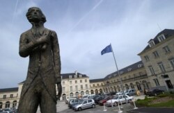FILE - A statue of French historian and diplomat Alexis de Tocqueville is seen in the town of Saint-Lo, Normandy region, France, May 12, 2005.