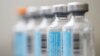 FILE - vials of flu vaccine in Philadelphia.
