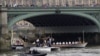 The royal barge Gloriana carries the Olympic flame along the river Thames, on the final day of the Torch Relay, London, July 27, 2012. 