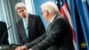 German Foreign Minister Frank-Walter Steinmeier (R) and US Secretary of State John Kerry (L) address a press conference, Jan. 31, 2014 in Berlin, Germany. 