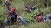 Anti-balaka fighters from the town of Bossembele rest while on patrol in the Boeing district of Bangui, Central African Republic, February 24, 2014.