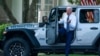 President Joe Biden gets out of a Jeep Wrangler Rubicon 4xE on the South Lawn of the White House in Washington, Aug. 5, 2021.