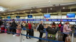 VOA Asia - Omicron travel troubles