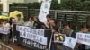 港人中聯辦抗議悼念楊天水促釋放政治犯