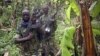 M23 rebel fighters are pictured as they withdraw near the town of Sake, some 42 km west of Goma on Nov. 30, 2012.