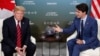 FILE - U.S. President Donald Trump, left, meets with Canada’s Prime Minister Justin Trudeau in a bilateral meeting at the G-7 Summit in Charlevoix, Quebec, Canada, June 8, 2018. 