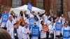 FILE - Scientists demonstrate outside the American Geophysical Union meeting in San Francisco in December, 2016. (The Natural History Museum.)