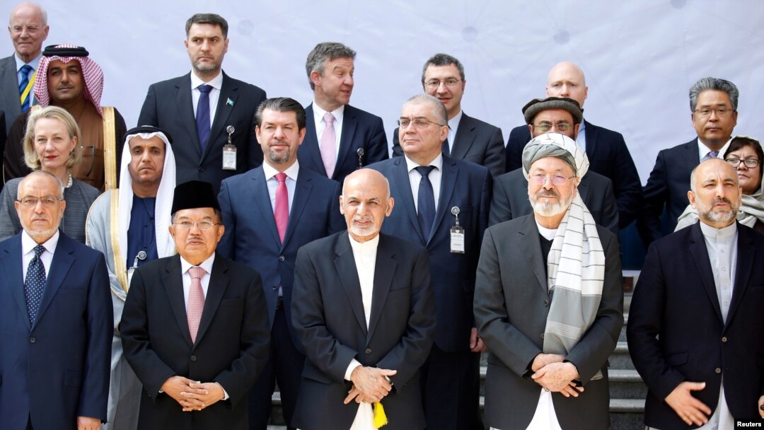 Afghan President Ashraf Ghani poses for a group photo during a peace and security cooperation conference in Kabul, Afghanistan, Feb. 28, 2018.