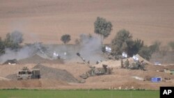 Artilharia móvel israelita perto da fronteira com Gaza, 28 outubro 2023