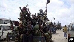 Al-Shabab fighters display weapons in Mogadishu, Somalia (undated file photo).