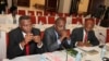 FILE - Burundi opposition members sit during peace talks at Entebbe State House, east of Uganda's capital Kampala, Dec. 28, 2015.
