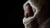 FILE - A 40-year-old woman who was says she was held captive and repeatedly raped by 15 Eritrean soldiers over a period of a week speaks during an interview at a hospital in Mekele, in the Tigray region of northern Ethiopia, May 14, 2021.