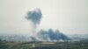 Smoke rises above the Gaza Strip amid the ongoing conflict between Israel and Hamas, as seen from southern Israel, Jan. 14, 2025.