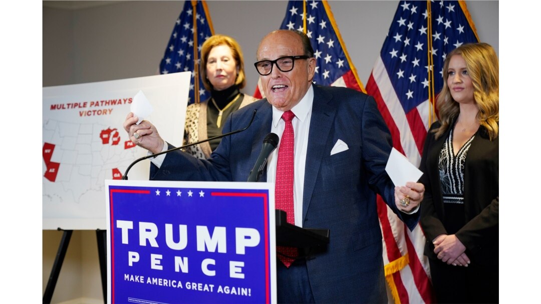 FILE - Rudy Giuliani, a lawyer for President Donald Trump, speaks during a news conference at the Republican National Committee headquarters, Nov. 19, 2020, in Washington.