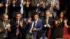 Italian Interior Minister and Deputy-Premier Matteo Salvini is applauded by The League party's lawmakers as he addresses the Senate in Rome, Aug. 13, 2019.