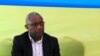 Kalisa Mbanda, Rwanda national electoral commission chairman, watches as votes are being counted at Amahoro polling station soon after polling closed in Rwanda's capital Kigali, Dec. 18, 2015. 